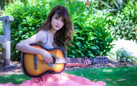 アジアの音楽の女の子、ギター