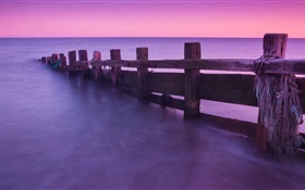 フェンス、海、夕日 HDの壁紙