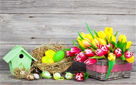 イースター、カラフルな卵、チューリップの花